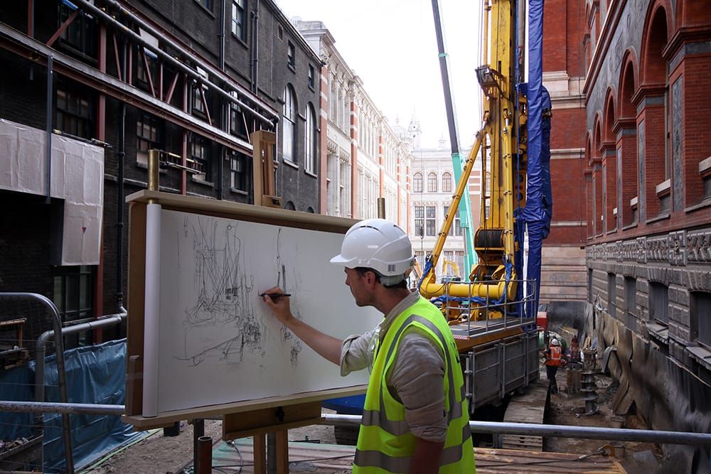 Liam O'Connor starts the scroll in the midst of the building work
